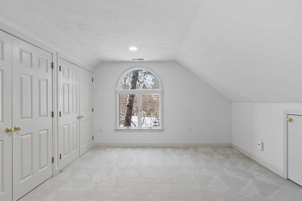30 Duck Road Reading, MA 01867 - Photo 34 of 42 a view of an empty room with a window