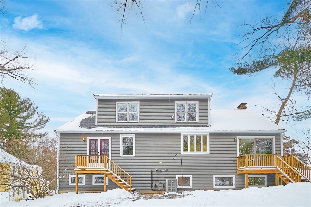 30 Duck Road Reading, MA 01867 - Photo 39 of 42 a backyard of a house with a street