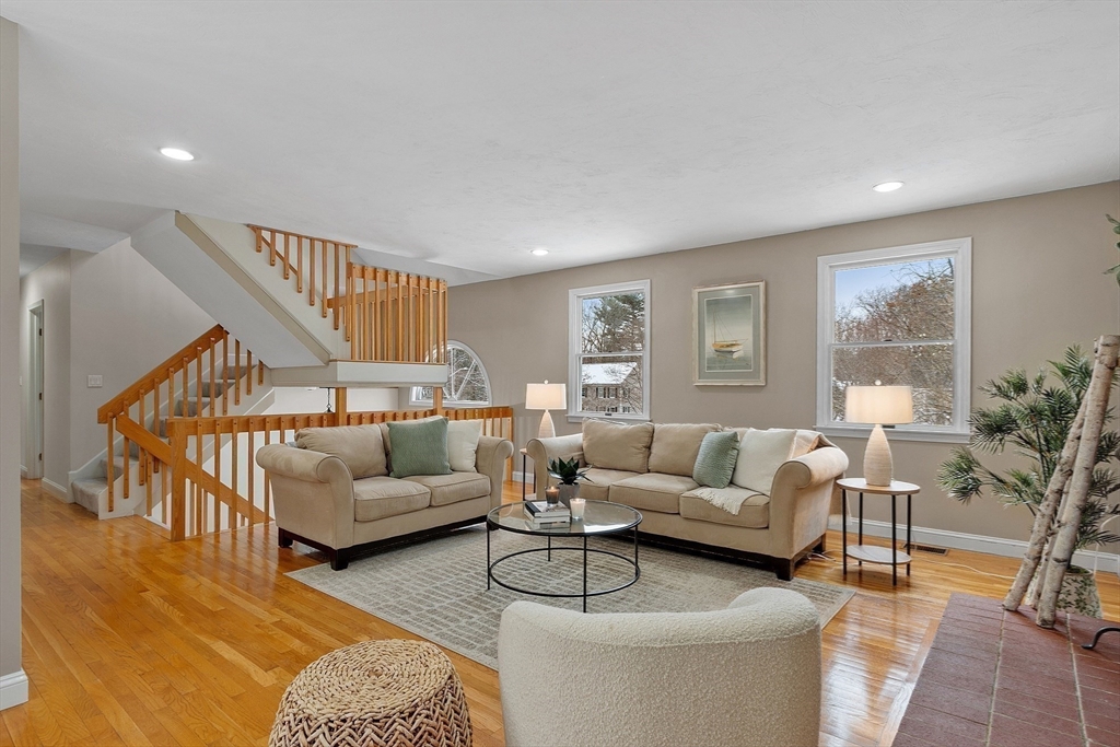 30 Duck Road Reading, MA 01867 - Photo 5 of 42 a living room with furniture and a wooden floor