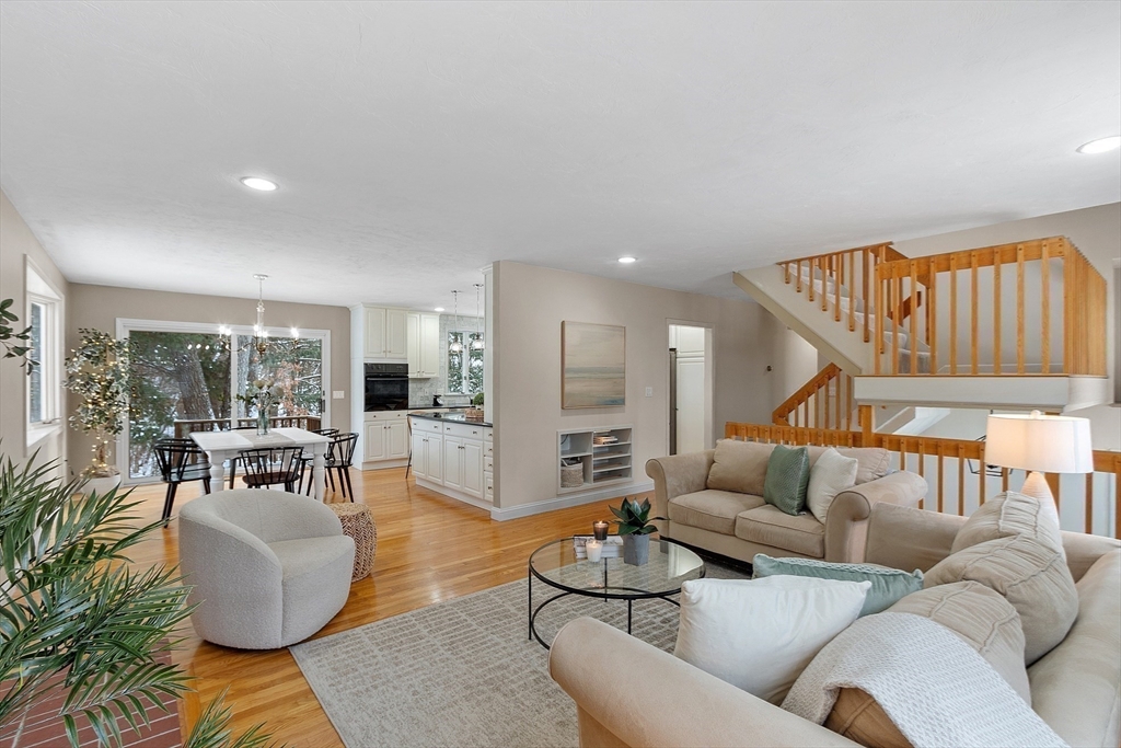 30 Duck Road Reading, MA 01867 - Photo 8 of 42 a living room with furniture and a large window