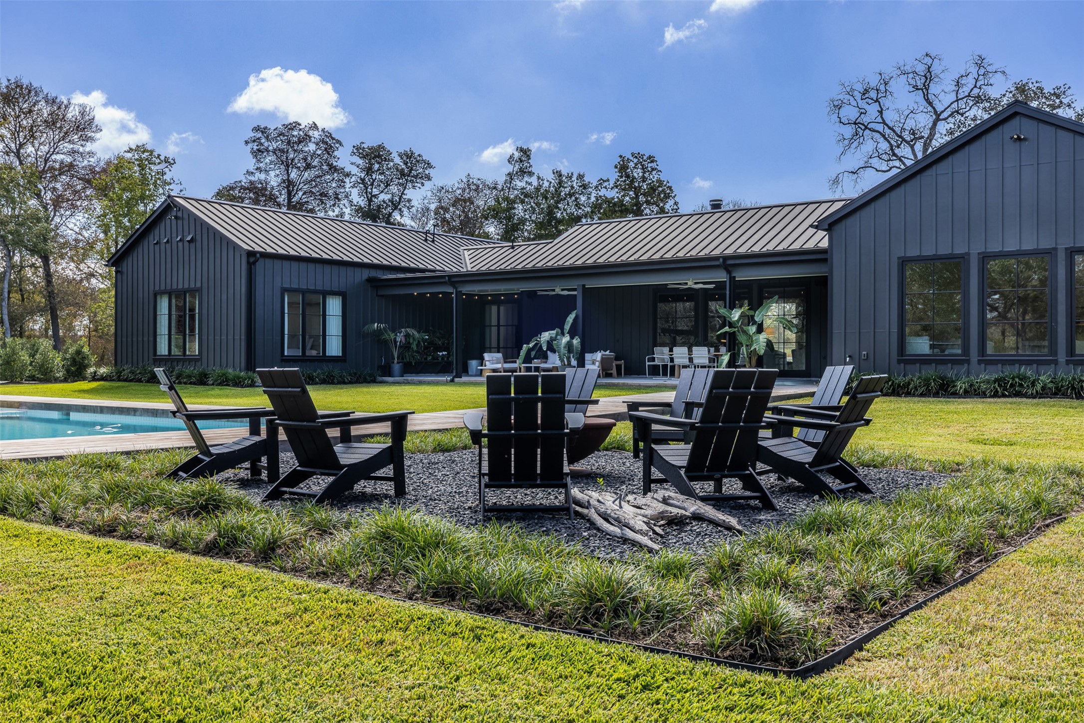 a view of a house with backyard porch and patio