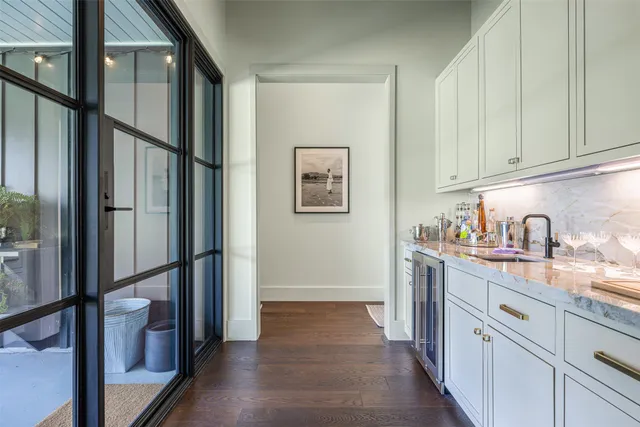 a view of hallway with cabinets