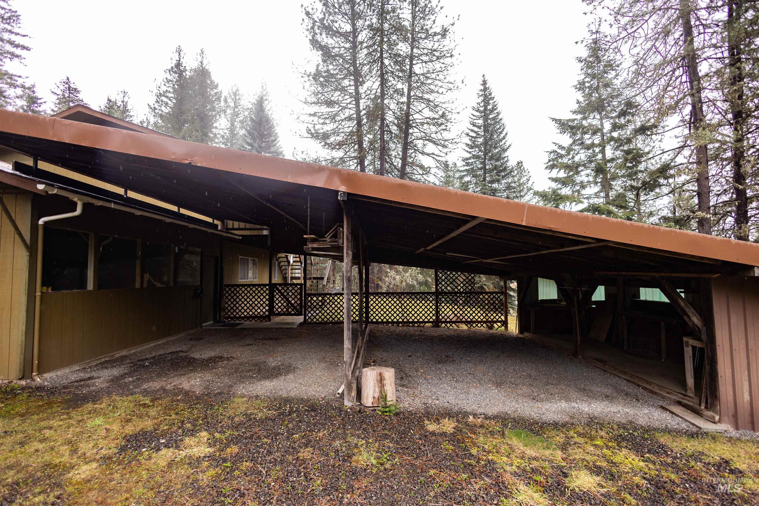 717 Big Cedar Road Kooskia, ID 83539 - Photo 25 of 50 View of parking featuring an attached carport