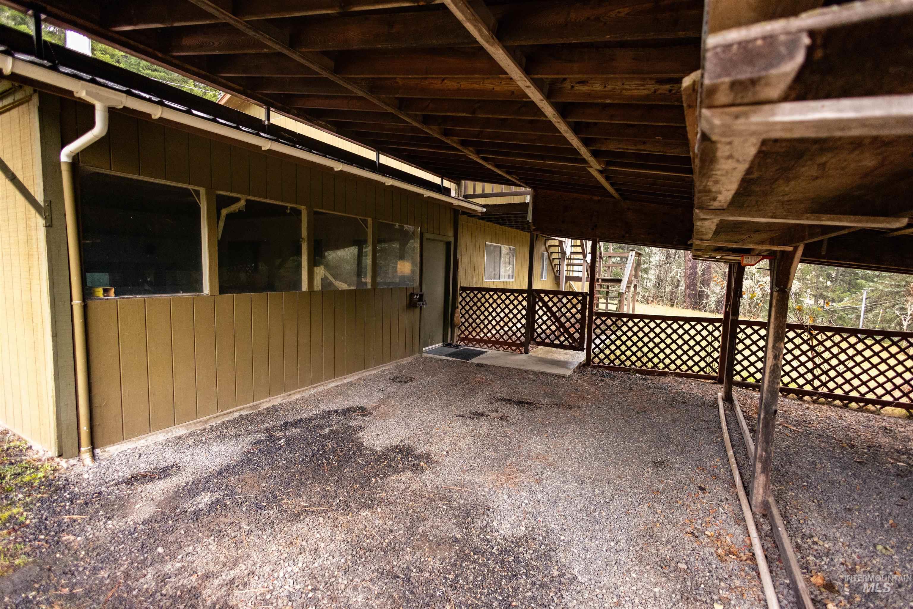 717 Big Cedar Road Kooskia, ID 83539 - Photo 27 of 50 View of patio / terrace with an outbuilding and an exterior structure