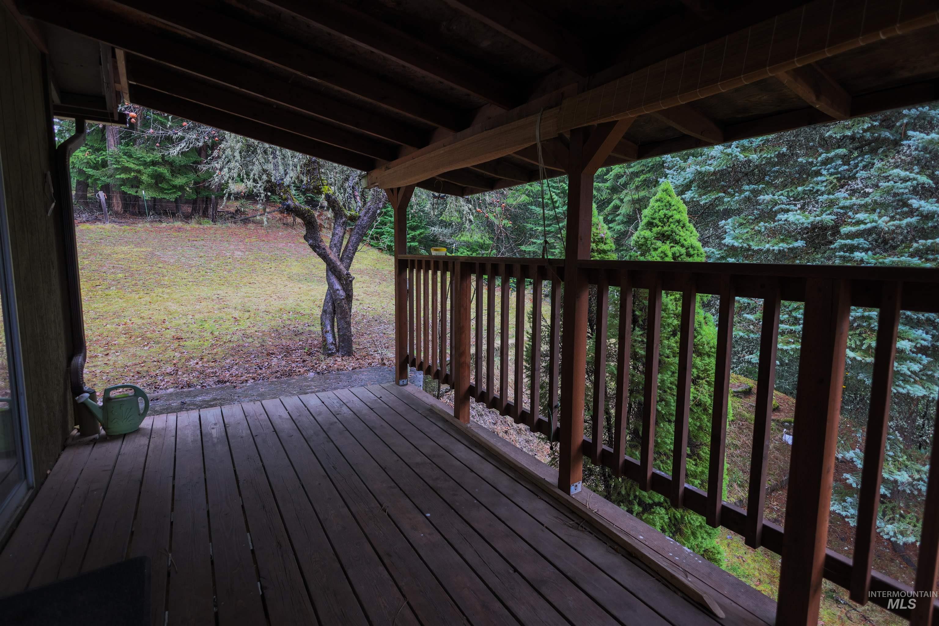 717 Big Cedar Road Kooskia, ID 83539 - Photo 8 of 50 Deck with a lawn
