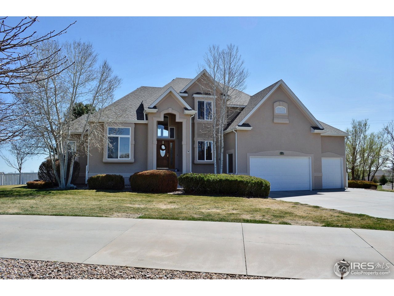 6120 Ashcroft Road Greeley, CO 80634 - Photo 1 of 25 New Stucco,Roof,Garage Doors, & Gutters