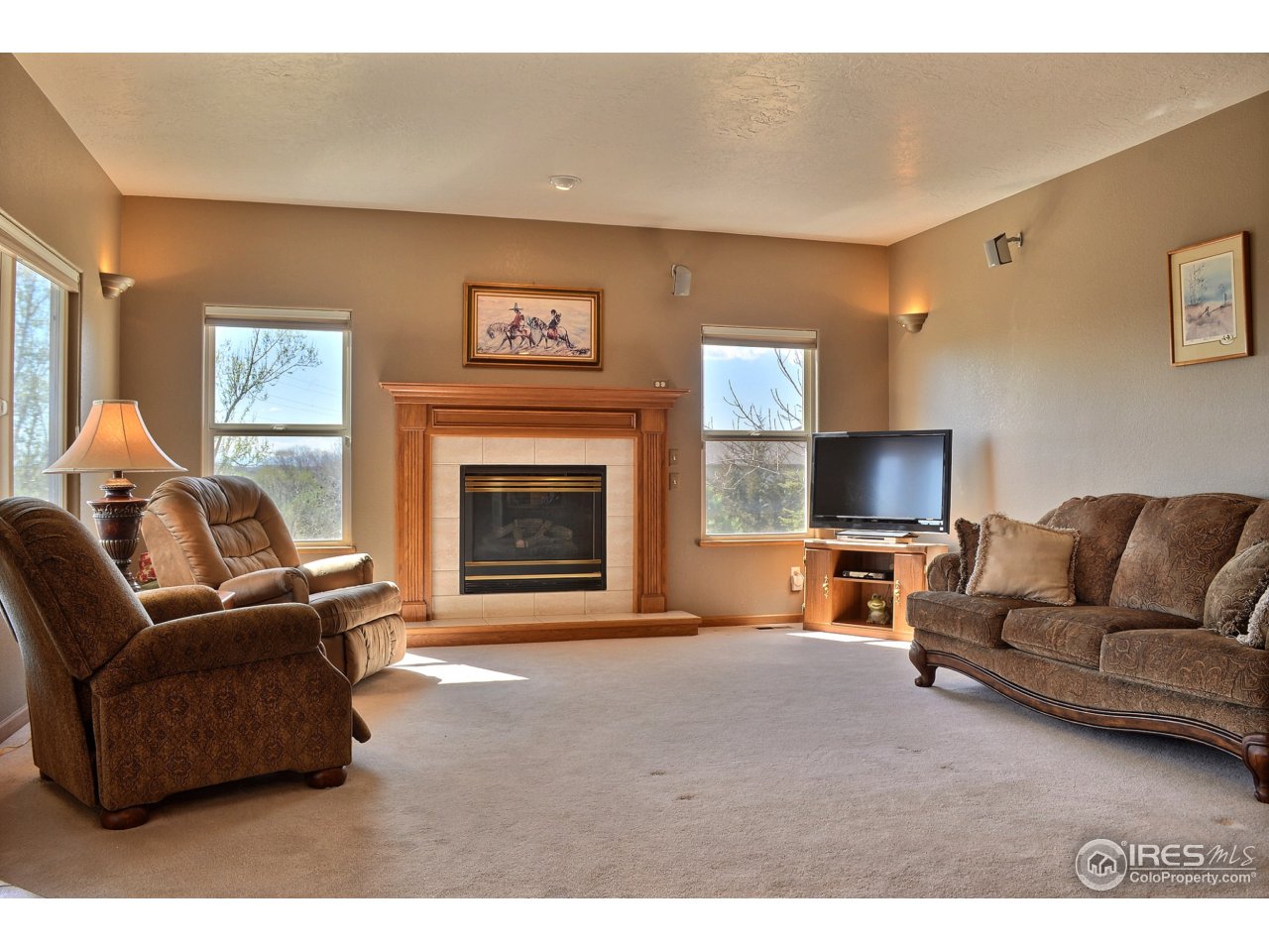 6120 Ashcroft Road Greeley, CO 80634 - Photo 12 of 25 Kitchen Opens Up To Family Room