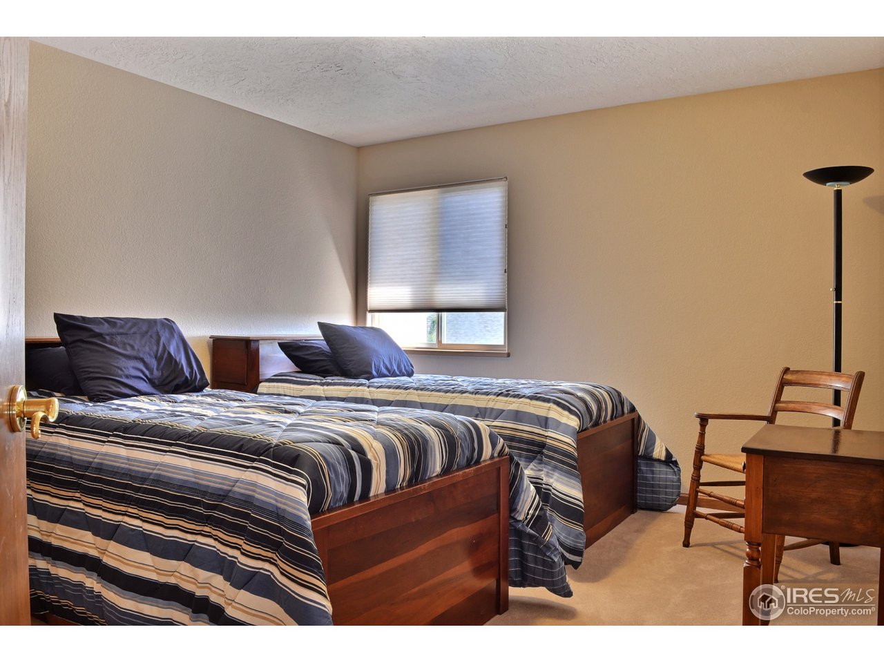 6120 Ashcroft Road Greeley, CO 80634 - Photo 15 of 25 Head Upstairs To 3 Bedrooms