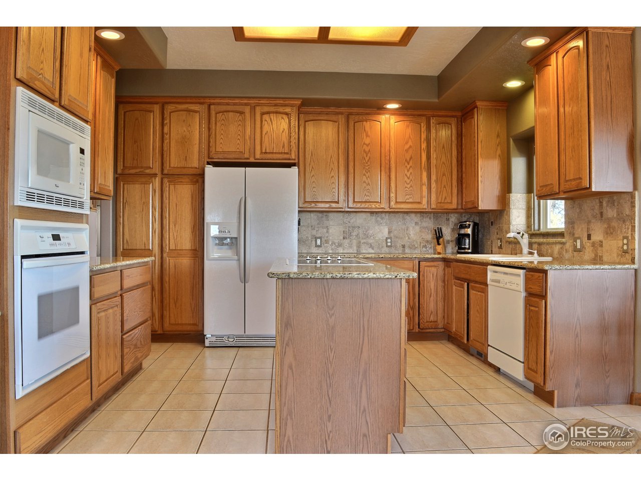 6120 Ashcroft Road Greeley, CO 80634 - Photo 10 of 25 Lovely Cabinetry and Appliances Included