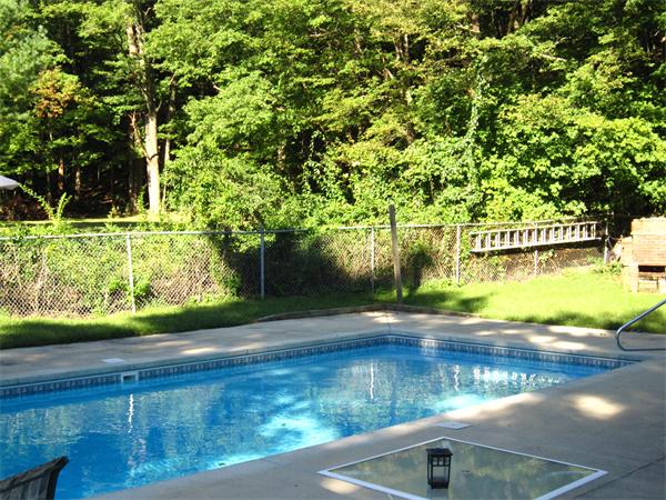 112 Sibley Road Waltham, MA 02453 - Photo 16 of 20 a view of a water fountain with wooden fence