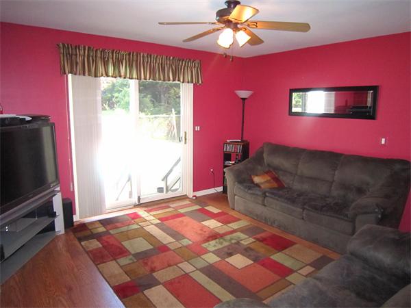 112 Sibley Road Waltham, MA 02453 - Photo 7 of 20 a bedroom with a bed and a flat screen tv
