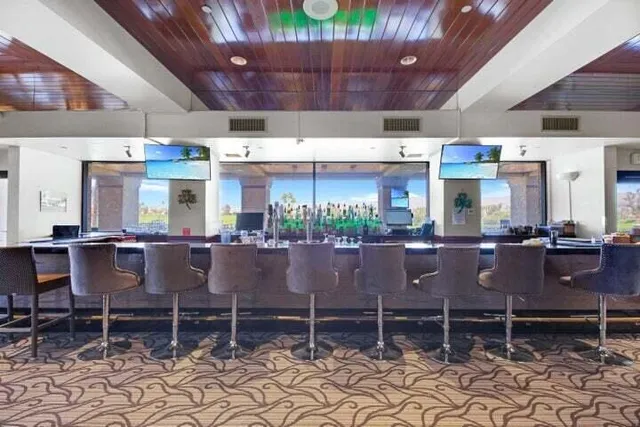 a view of an outdoor space with lounge chair