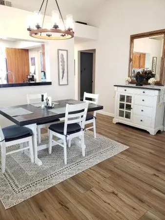 a view of a dining room with furniture