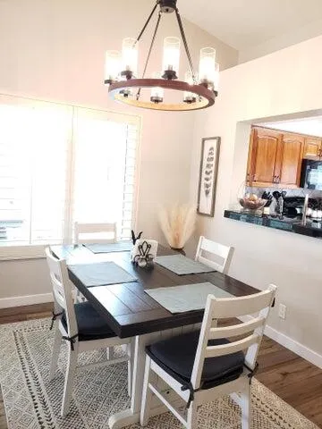 a view of a dining room with furniture
