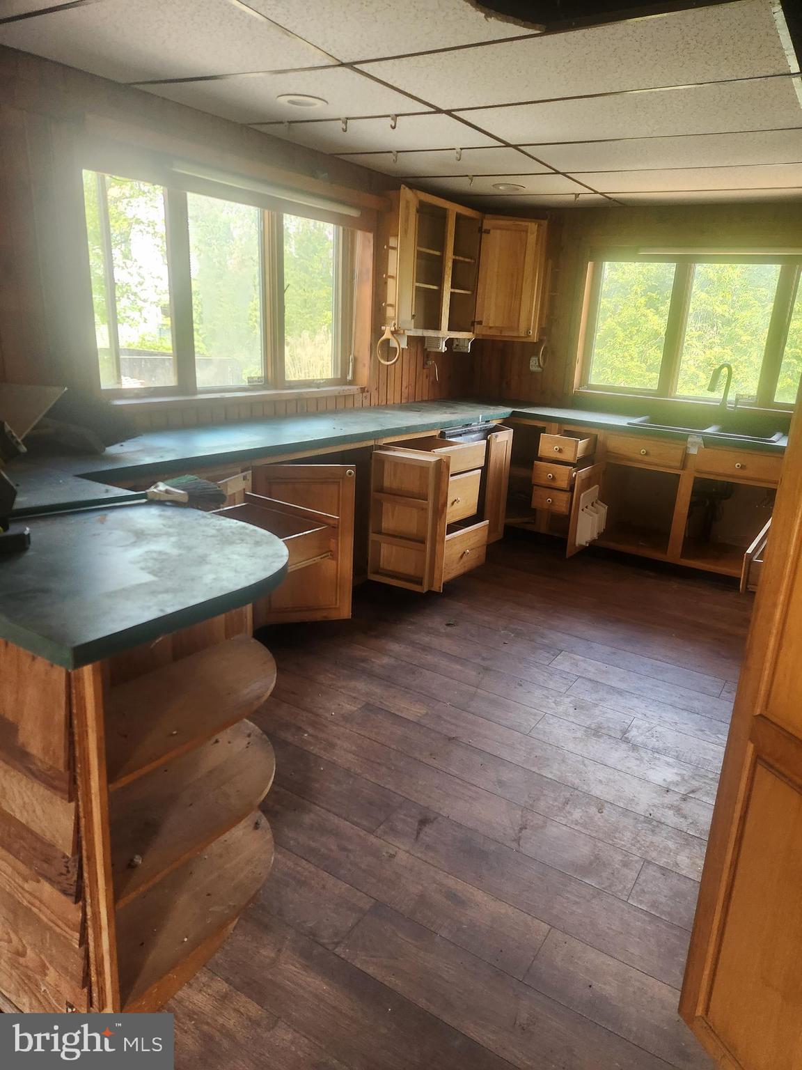 5573 Highway 9 Tuckerton, NJ 08087 - Photo 13 of 32 a kitchen with a sink stove and cabinets