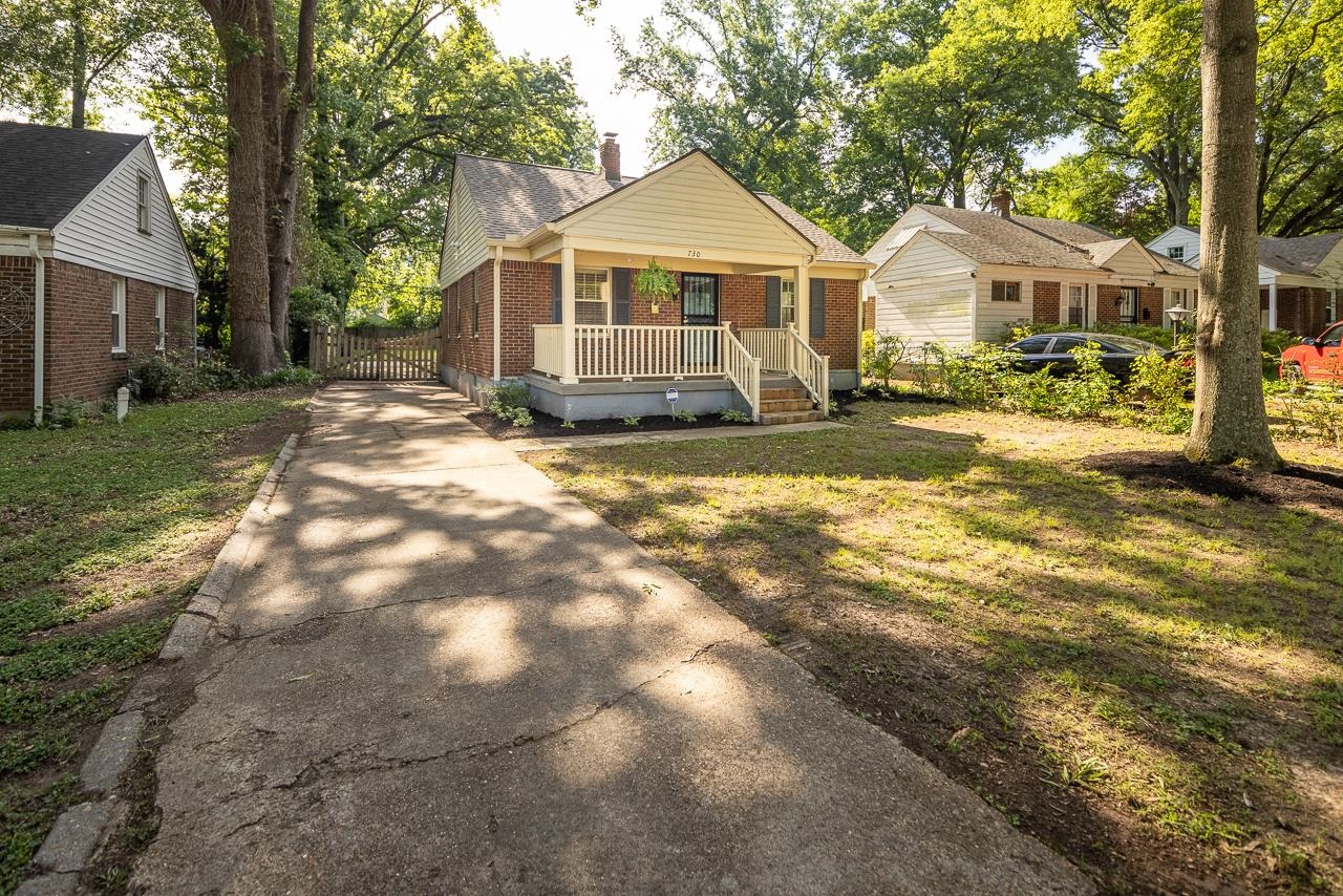 730 Shotwell Street Memphis, TN 38111 - Photo 1 of 20 a front view of a house with a yard