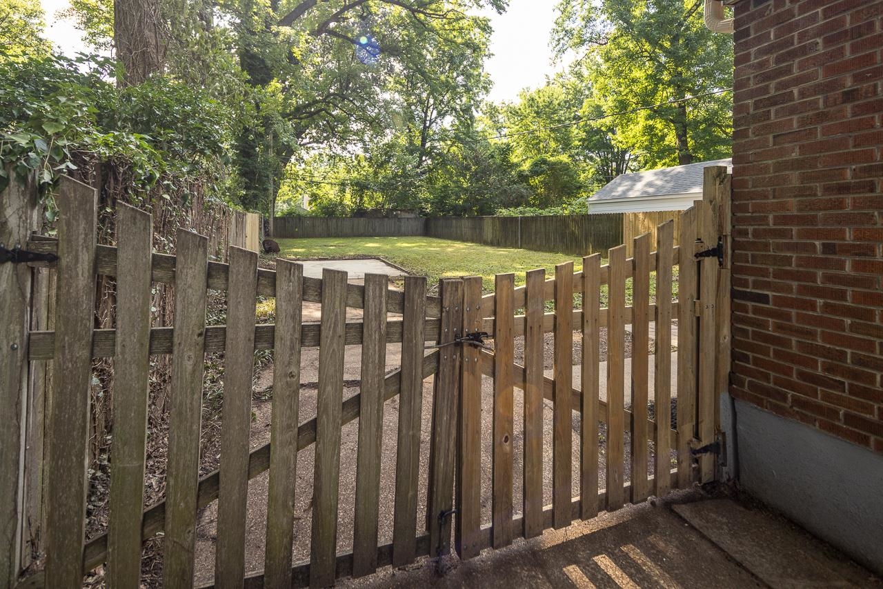 730 Shotwell Street Memphis, TN 38111 - Photo 19 of 20 a view of a wooden door with a tree