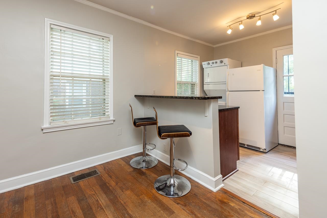 730 Shotwell Street Memphis, TN 38111 - Photo 10 of 20 a view of a kitchen with workspace and a window