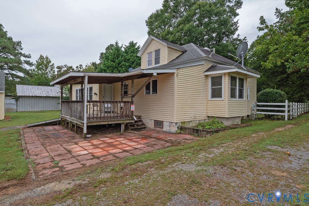 1881 Fairport Road Reedville, VA 22539 - Photo 34 of 54 Exterior featuring light-toned siding, a covered p