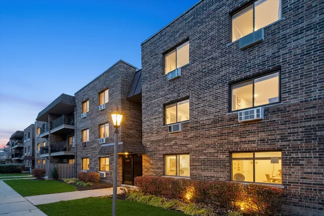 a view of a car park in front of house