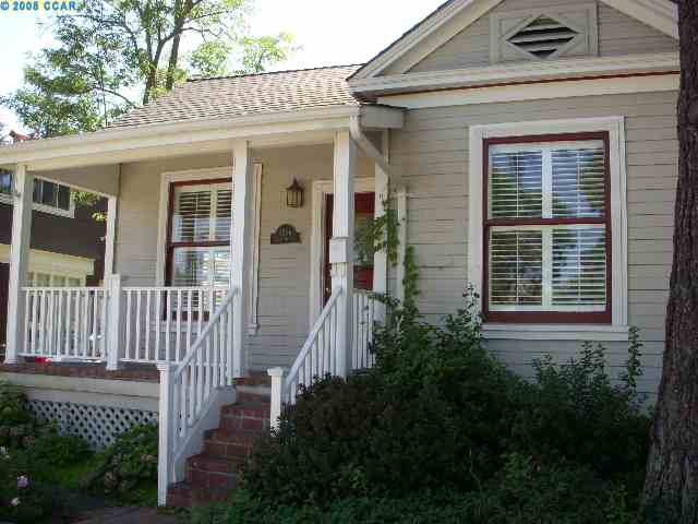 a front view of a house with a porch