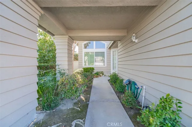 a view of a pathway with a house