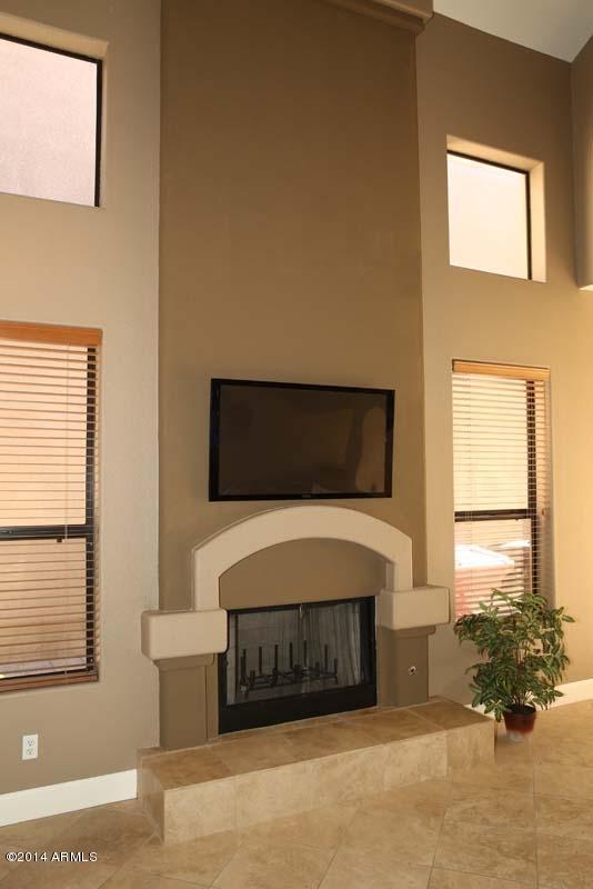 7525 East Gainey Ranch Road, Unit 107 Scottsdale, AZ 85258 - Photo 16 of 39 Fireplace