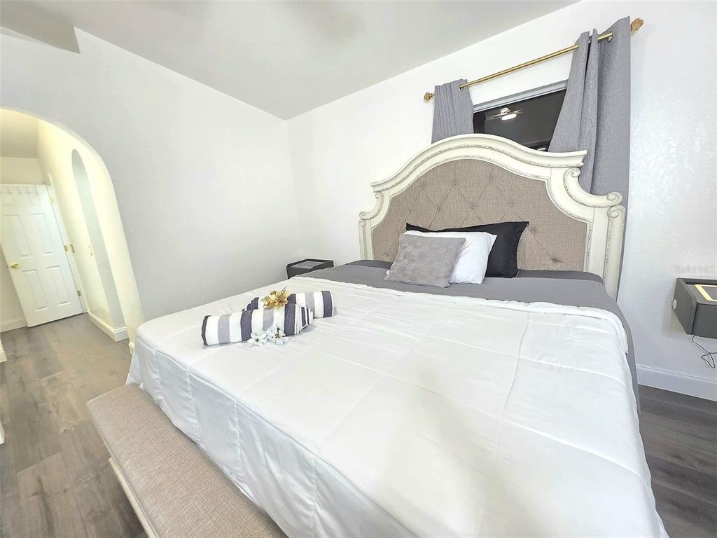 24921 Ravello Street Land O Lakes, FL 34639 - Photo 25 of 36 a bedroom with a bed and dresser