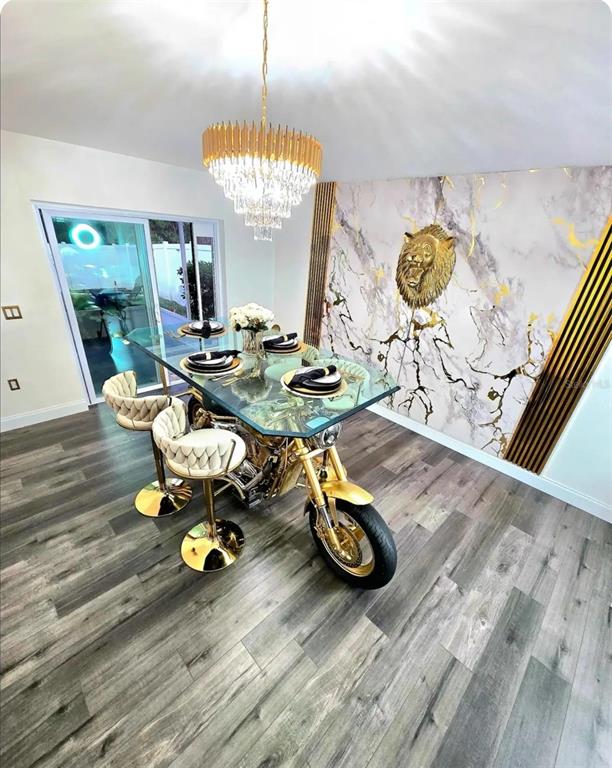 24921 Ravello Street Land O Lakes, FL 34639 - Photo 34 of 36 a view of a dining room with furniture