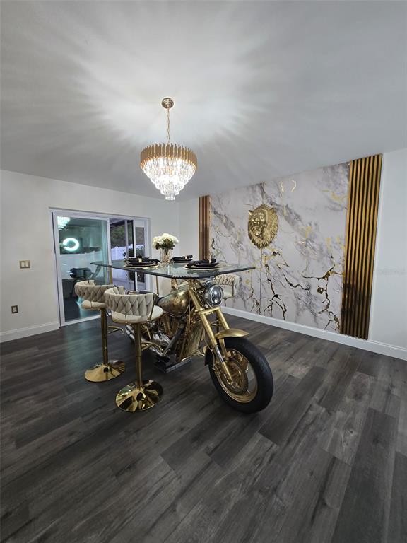 24921 Ravello Street Land O Lakes, FL 34639 - Photo 10 of 36 a view of a room with gym equipment