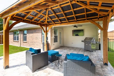 a view of living room and patio