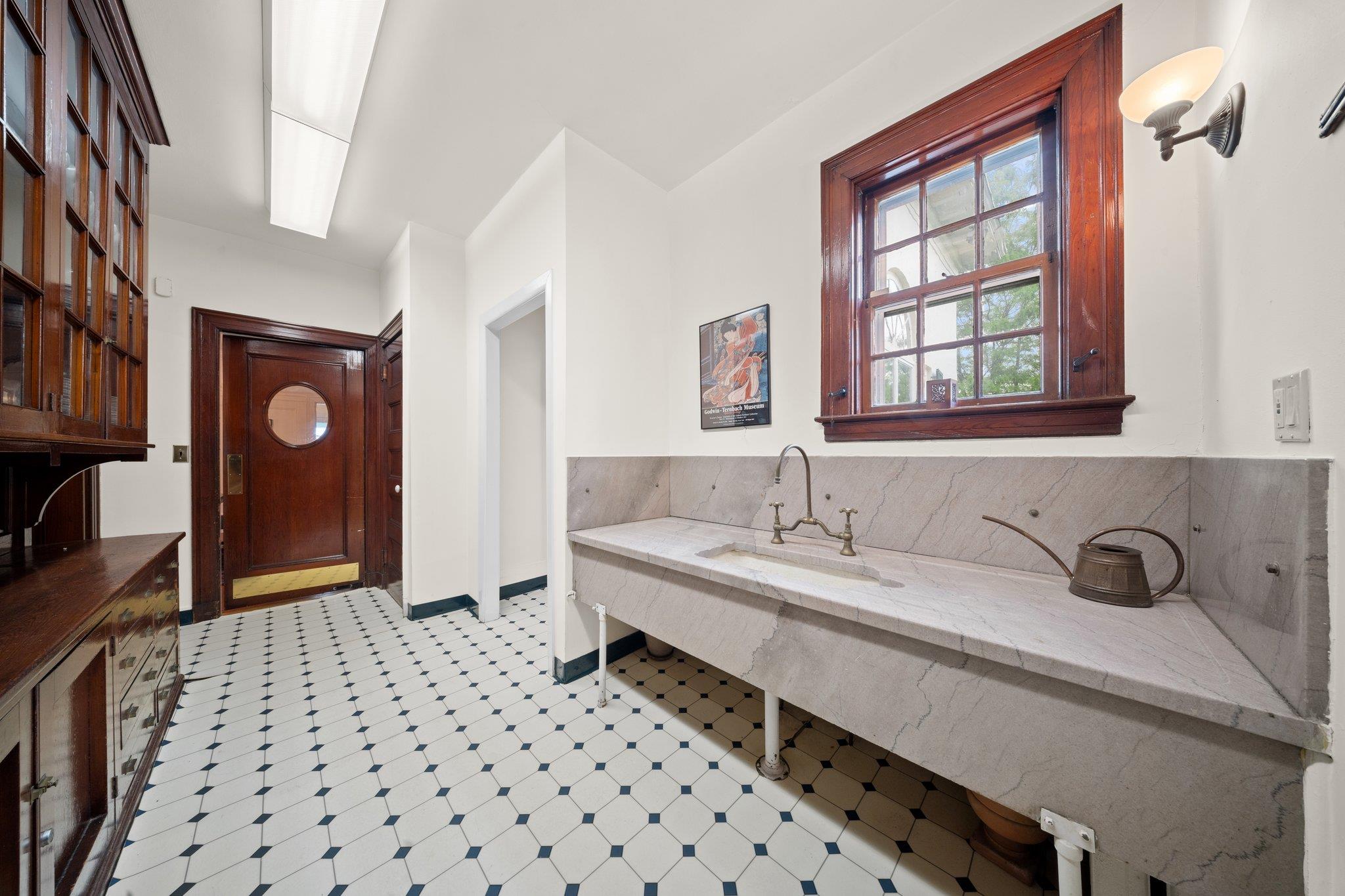 10-08 Shore Road Queens, NY 11363 - Photo 13 of 47 a bathroom with a sink a vanity and a mirror