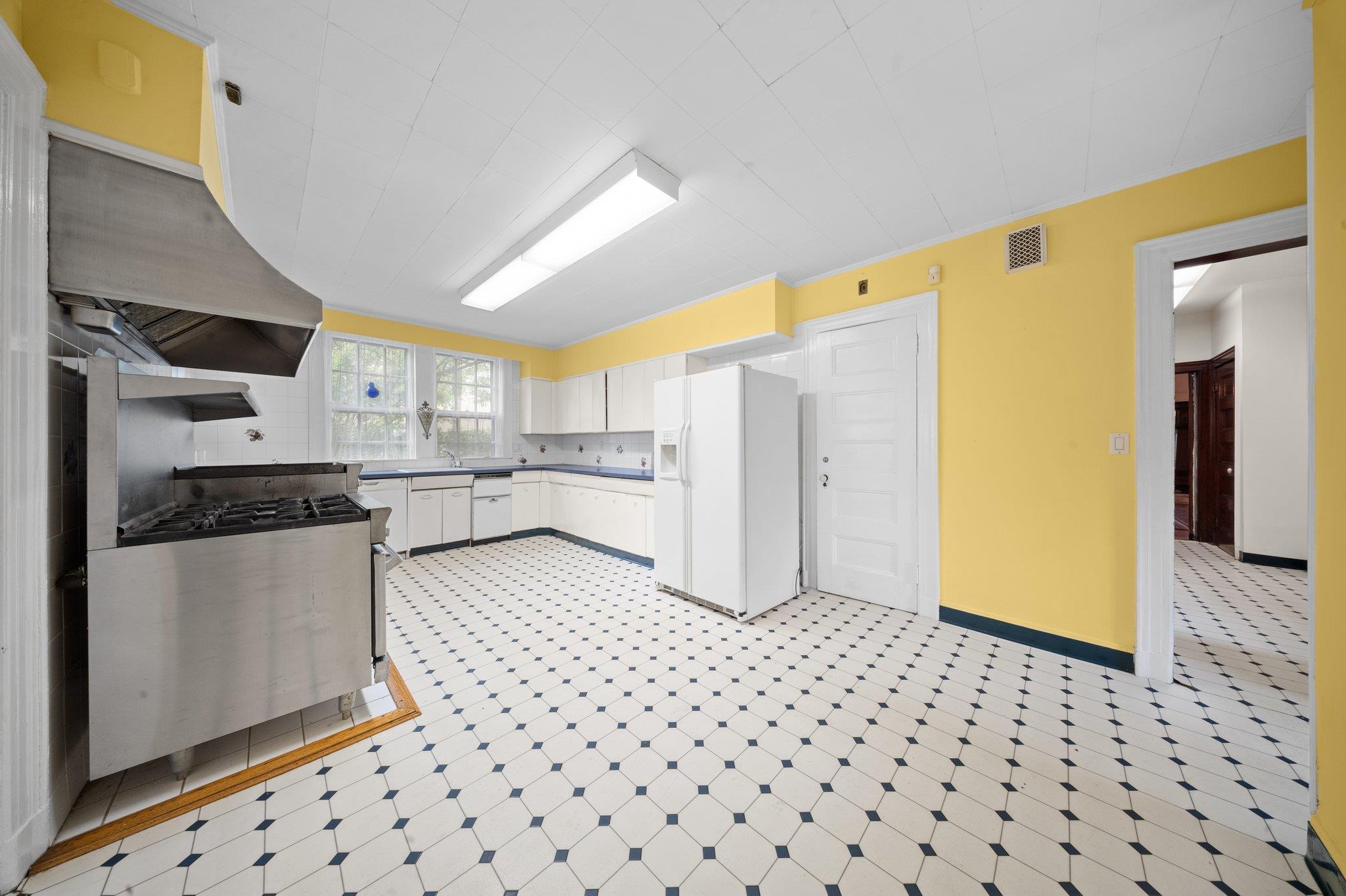 10-08 Shore Road Queens, NY 11363 - Photo 14 of 47 a kitchen with granite countertop a refrigerator and a stove