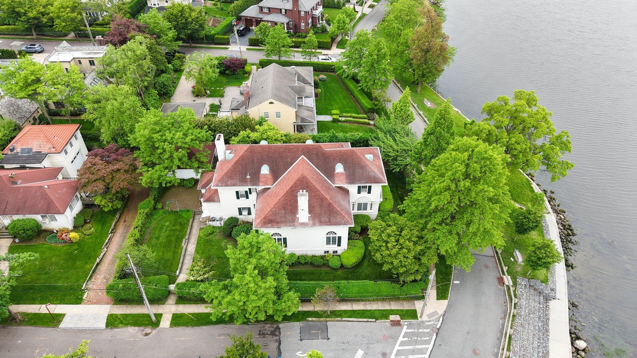 10-08 Shore Road Queens, NY 11363 - Photo 3 of 47 an aerial view of house with yard