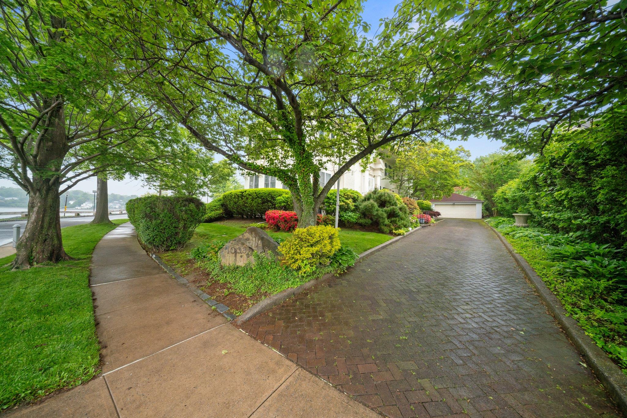 10-08 Shore Road Queens, NY 11363 - Photo 35 of 47 a view of a garden with pathway