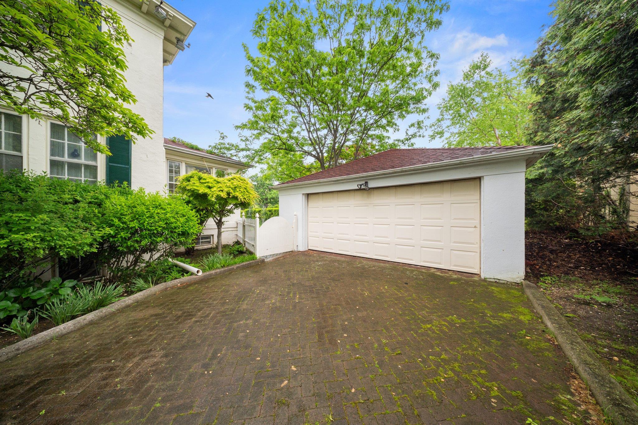 10-08 Shore Road Queens, NY 11363 - Photo 36 of 47 front view of a house with a yard