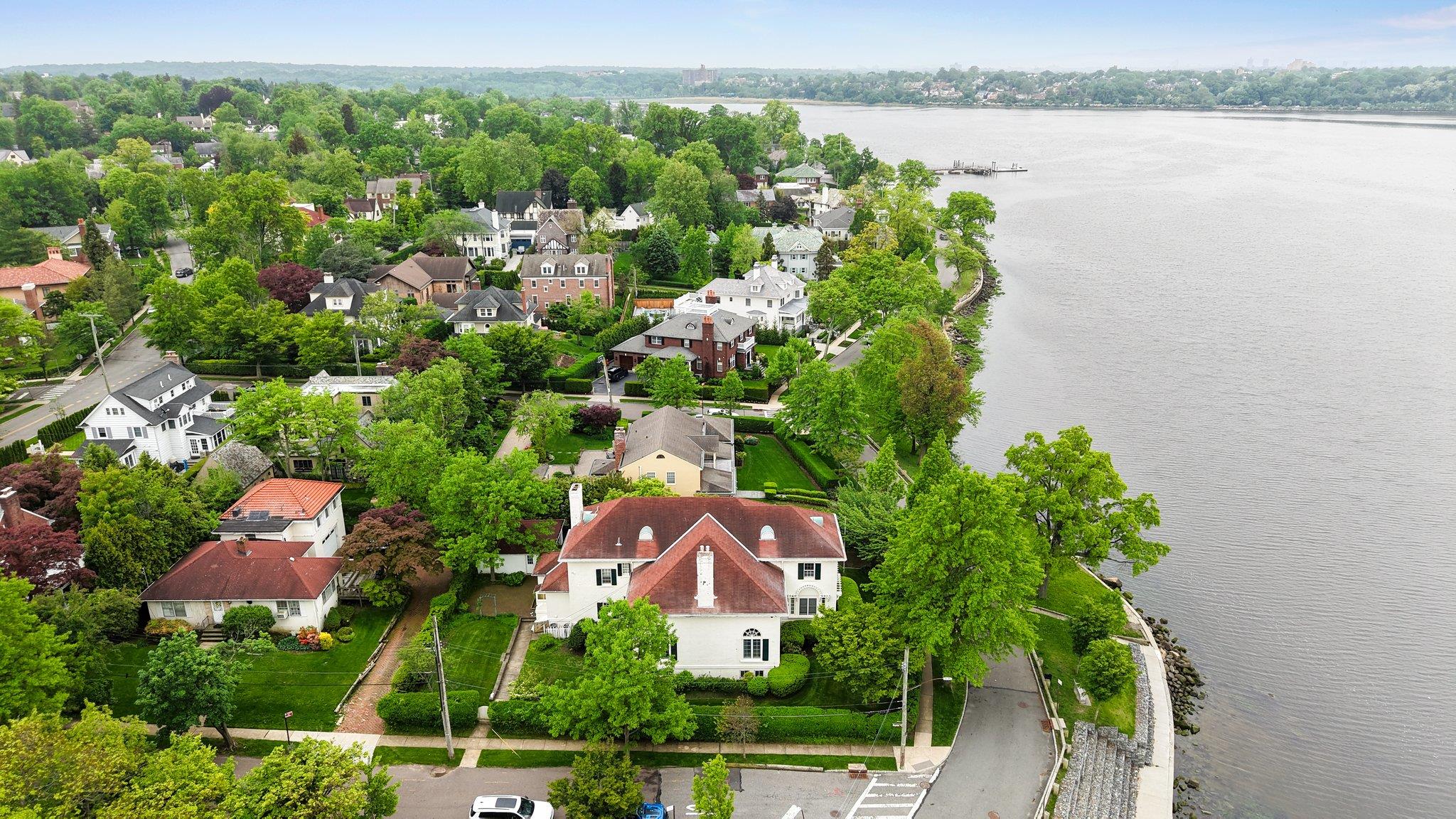 10-08 Shore Road Queens, NY 11363 - Photo 42 of 47 an aerial view of a house with a lake view