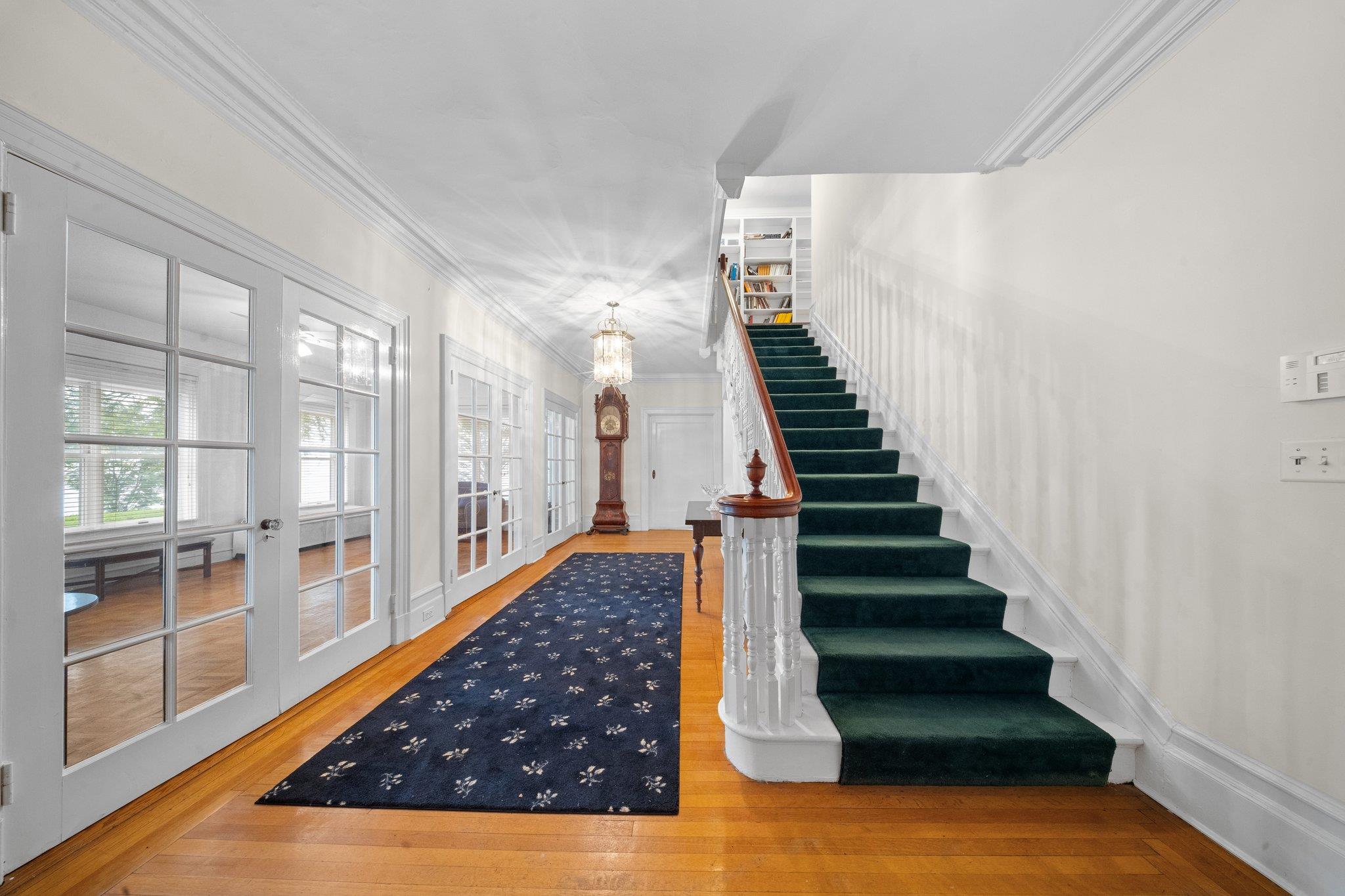 10-08 Shore Road Queens, NY 11363 - Photo 5 of 47 a view of entryway and hall with wooden floor