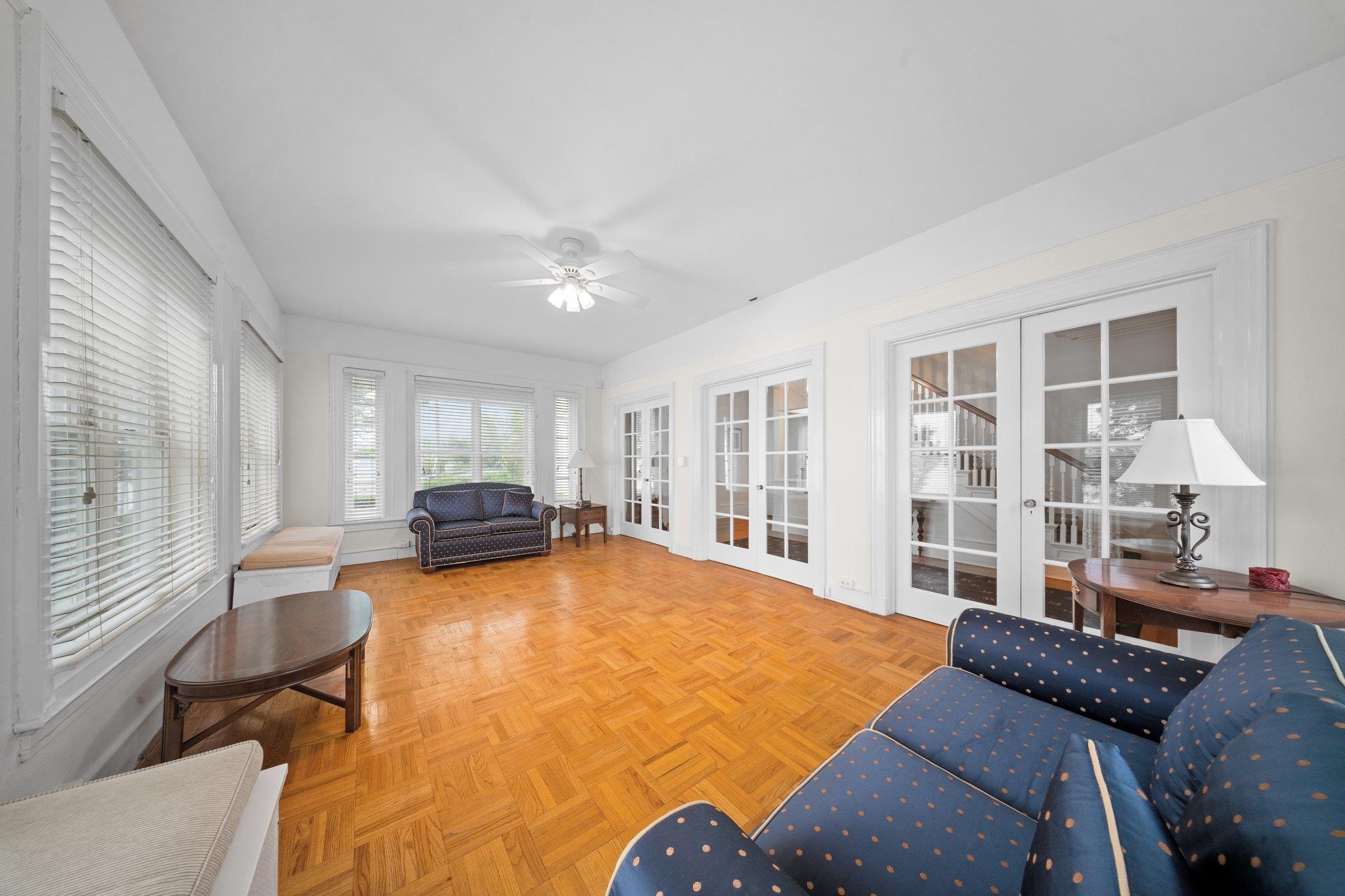 10-08 Shore Road Queens, NY 11363 - Photo 6 of 47 a bedroom with furniture and a large window