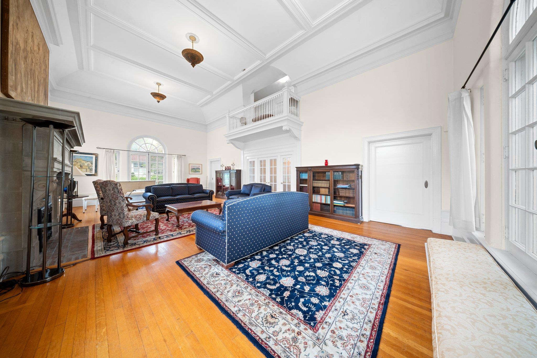 10-08 Shore Road Queens, NY 11363 - Photo 9 of 47 a living room with furniture and a rug
