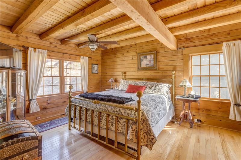 171 Davis Road Valencia, PA 16059 - Photo 12 of 25 Large master bedroom with hardwood floors, beamed ceilings, double closets and awesome views of nature!