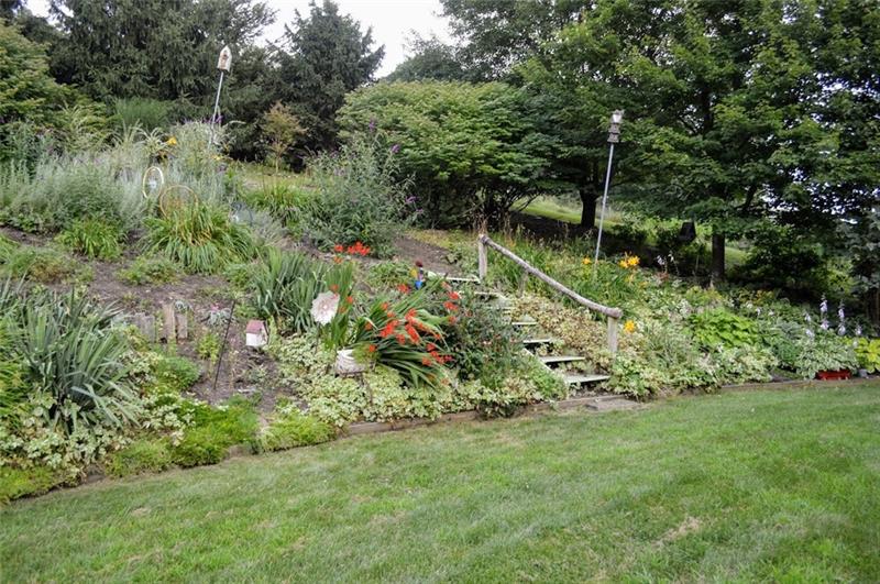 171 Davis Road Valencia, PA 16059 - Photo 24 of 25 Two tiered yard with tons of perennials. You'll love the privacy and nature back here!
