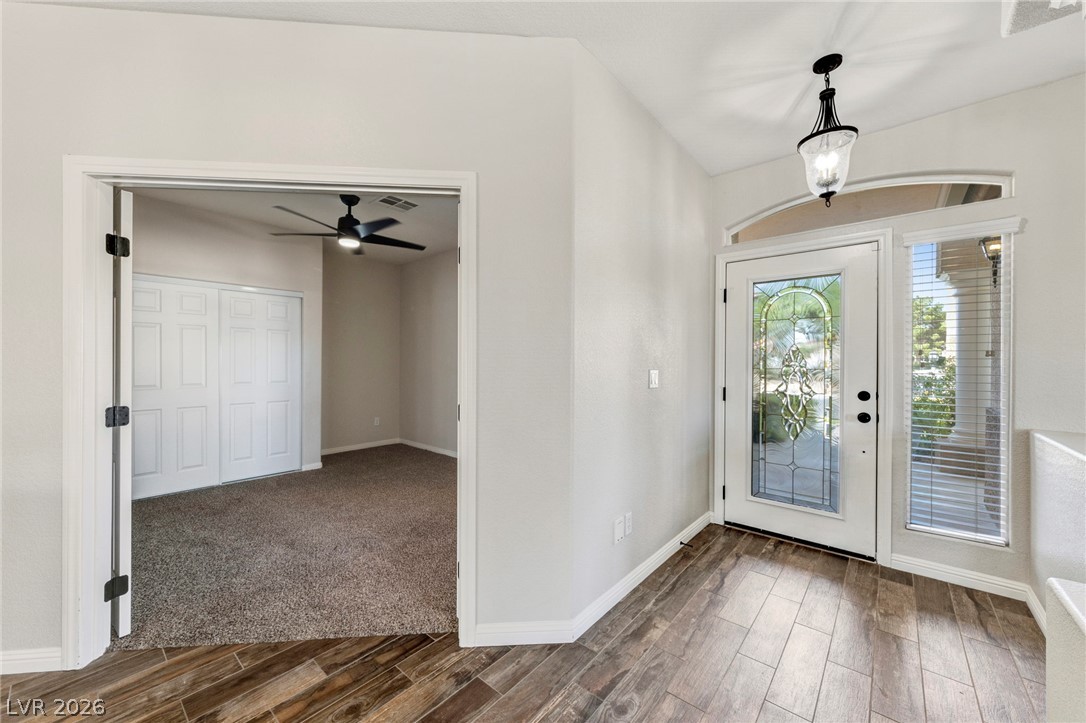 740 Aldo Rae Court, Unit NONE Henderson, NV 89052 - Photo 4 of 35 A welcoming entry features decorative glass on the primary door, creating an inviting first impression.