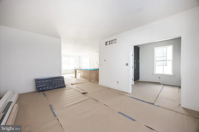 a view of an empty room and window