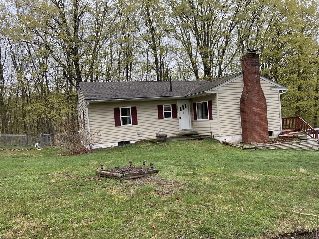 731 Greenfield Road Leyden, MA 01337 - Photo 1 of 36 a view of a backyard with a garden