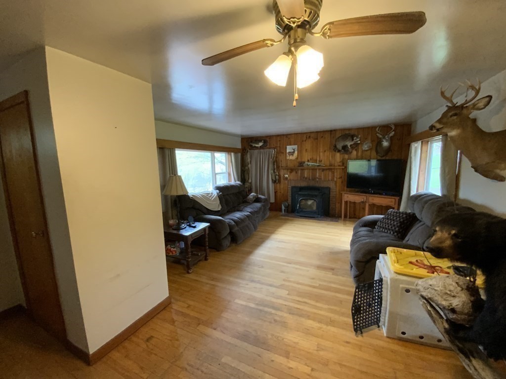 731 Greenfield Road Leyden, MA 01337 - Photo 14 of 36 a living room with furniture and a fireplace