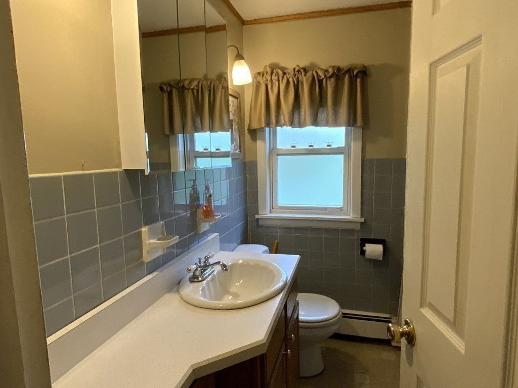 731 Greenfield Road Leyden, MA 01337 - Photo 16 of 36 a bathroom with a sink and a mirror