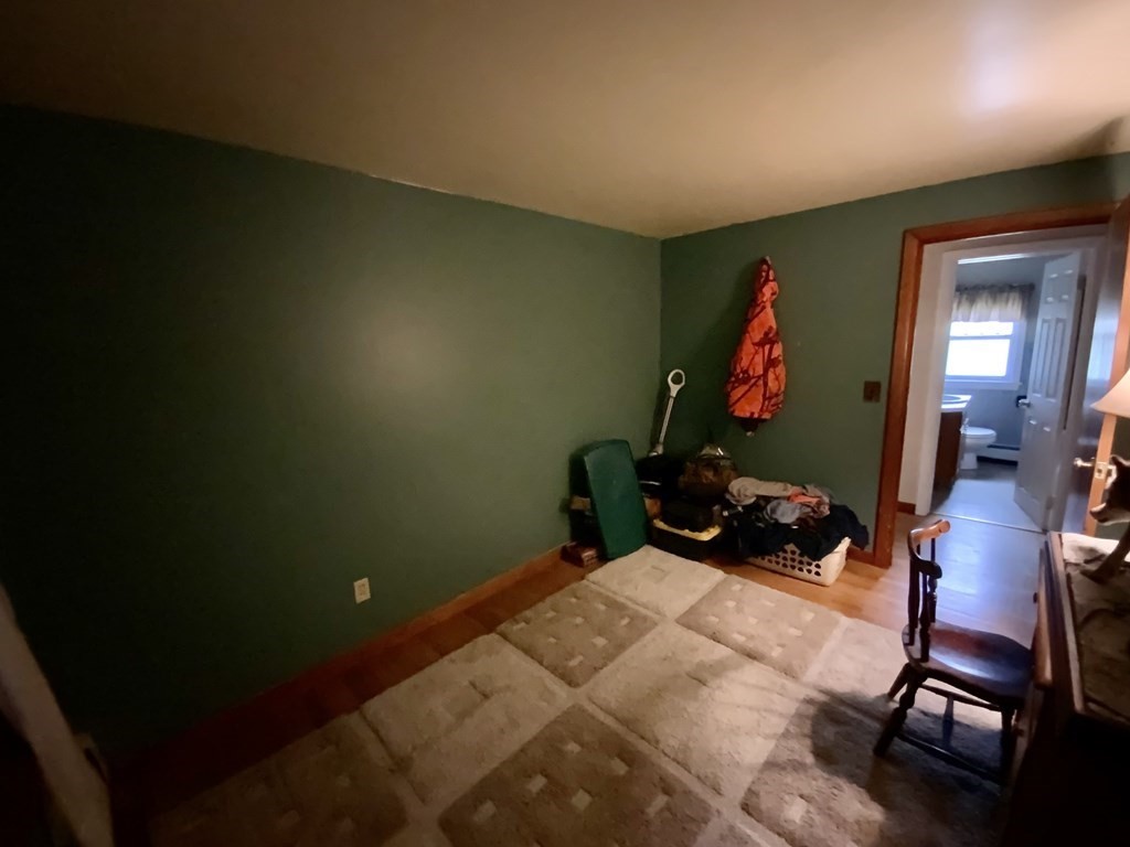 731 Greenfield Road Leyden, MA 01337 - Photo 18 of 36 a room with furniture and wooden floor