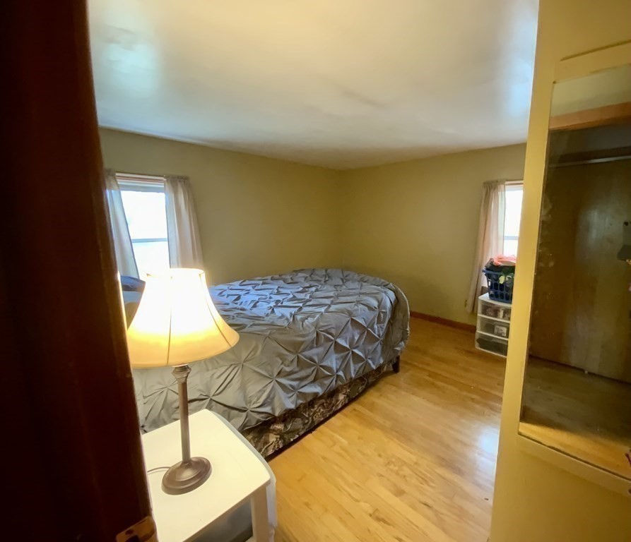 731 Greenfield Road Leyden, MA 01337 - Photo 21 of 36 a bedroom with a bed and dresser