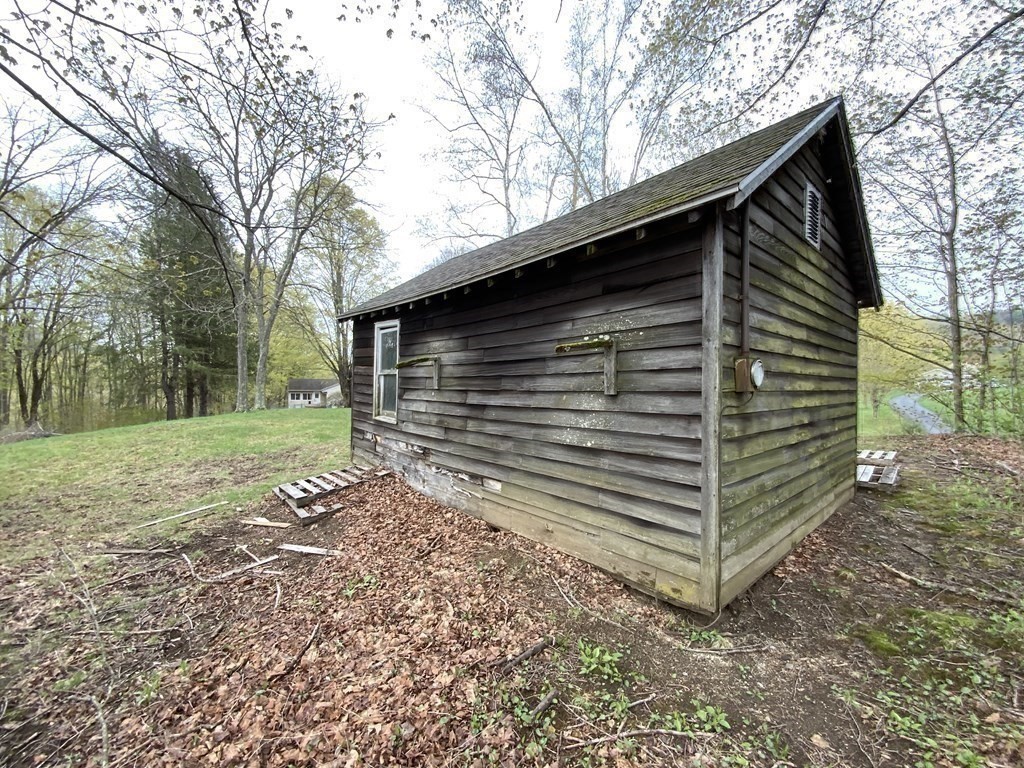 731 Greenfield Road Leyden, MA 01337 - Photo 30 of 36 a backyard of a house with lots of green space